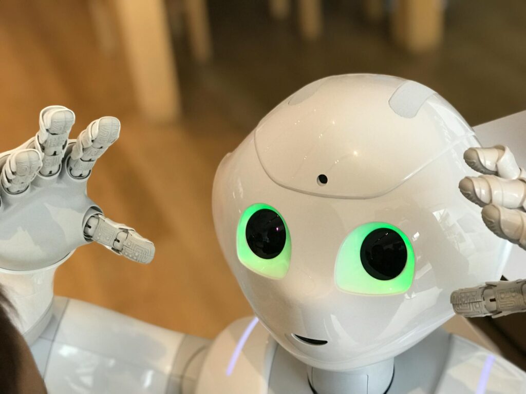 A futuristic humanoid robot with glowing green eyes in a modern setting.